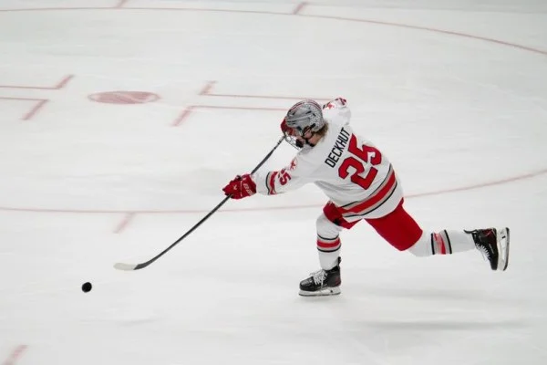 hockey player shooting